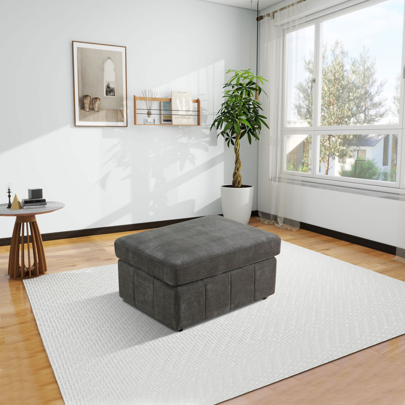Repose-pieds gris en microfibre pour le salon