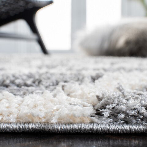 Cedrika Geometric Hand Woven Area Rug