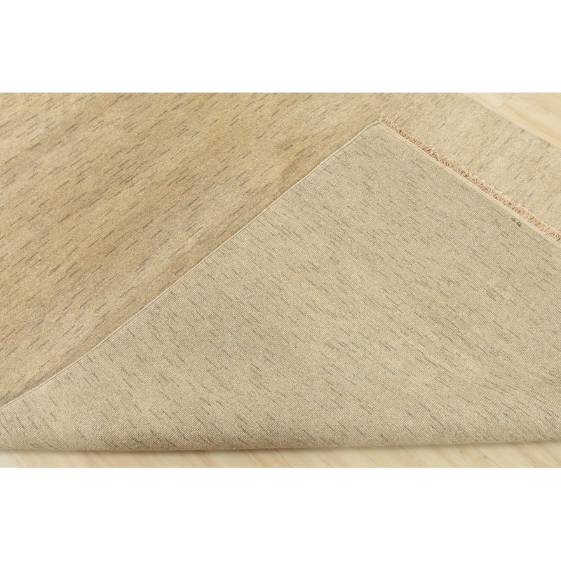 Tapis beige en laine noué à la main