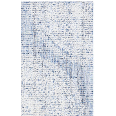 Ebony Hand Tufted Wool Cotton with Latex Floral Rug in Ivory/Blue