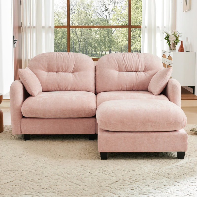 Canapé rose en forme de nuage avec assise moelleuse et douce en chenille