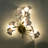 Jorelus 4-light Ginkgo Leaf Wall Light