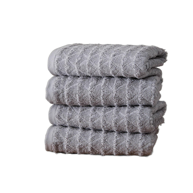 Ensemble de quatre serviettes de toilette géométriques en coton turc gris pâle, 40 x 75 cm