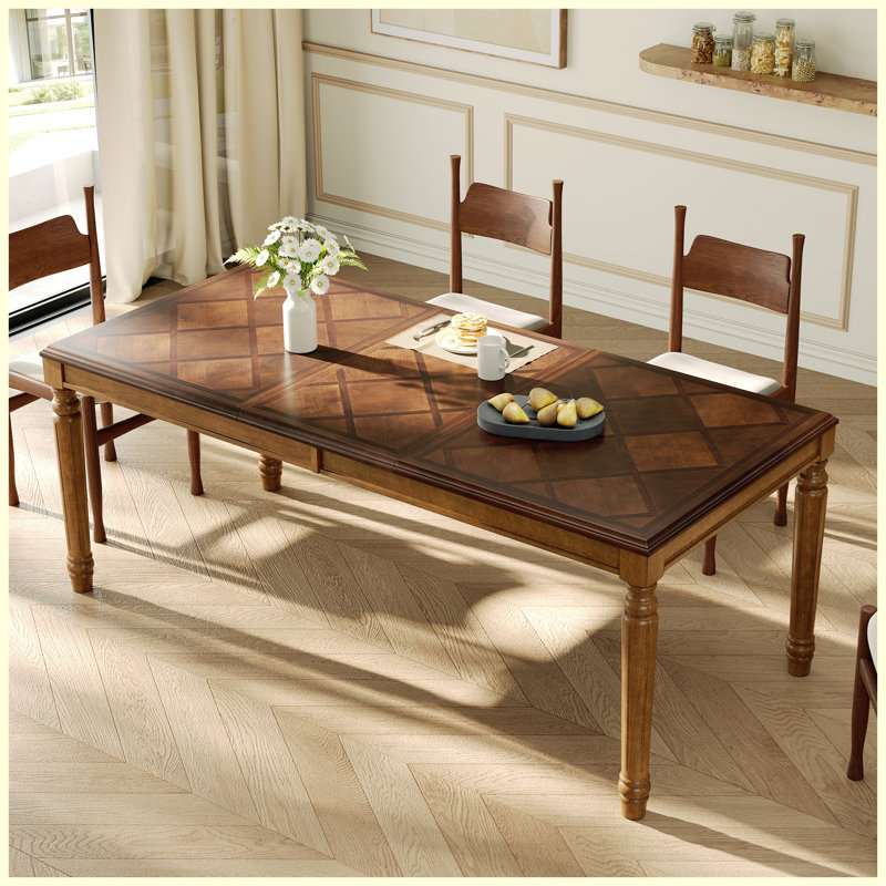 Table de salle à manger rectangulaire traditionnelle avec dessus en bois encadré et pieds tournés, noyer