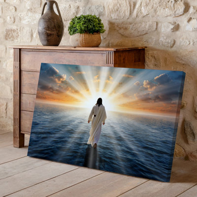 Canvas A Serene Scene Depicting A Figure Walking On Water With Wall Art The Sun Rising Dramatically Behind Them Casting Radiant Beams Canvas Wall Art