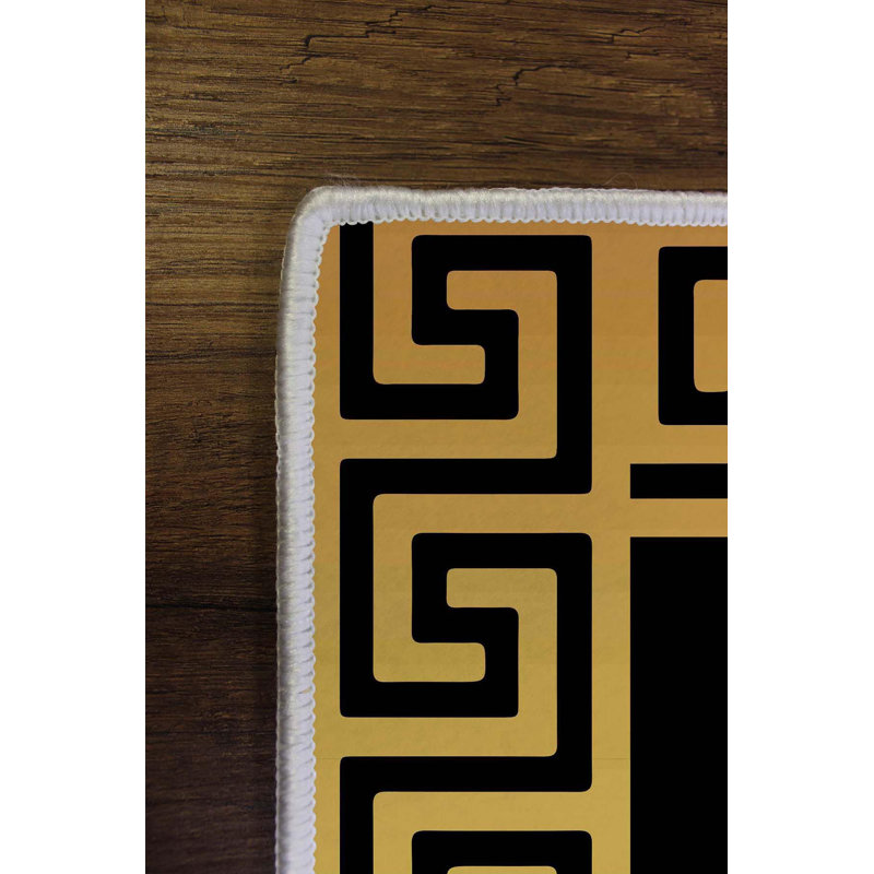 Polyester tissé à la machine Holladay en noir / jaune, Rectangle 1 pi 8 po x 2 pi 7 po