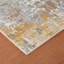 Tapis doré à motif abstrait Brazell-1244046284