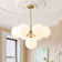 7 - Light Sputnik Design Tiered Chandelier With Globe Shade