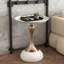 Petite table d'appoint ronde, tables d'appoint minimalistes modernes à piédestal en métal noir pour petits espaces, tables à martini décoratives à cannelures-960164137