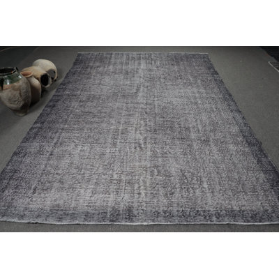 Experience The Understated Elegance Of This Turkish Gray Area Rug Featuring Modern Minimalist Design And Subtle Gray Tones In A Textured Pattern Enhancing Your Living Space