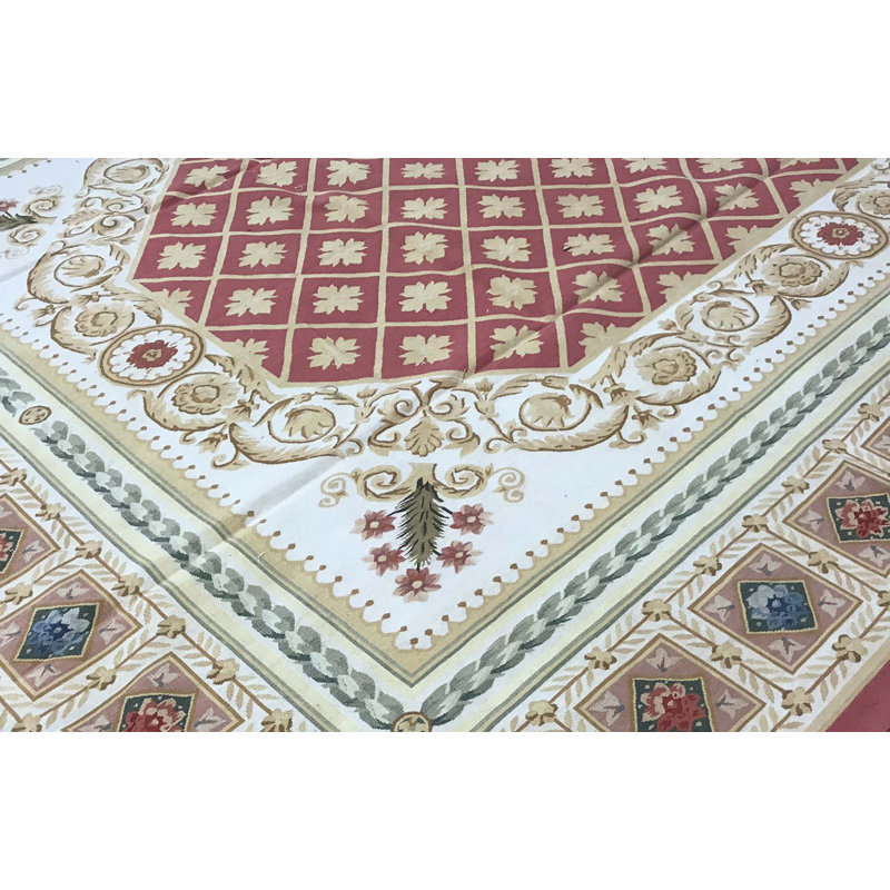 Tapis rose et ivoire de haute qualité noué à la main