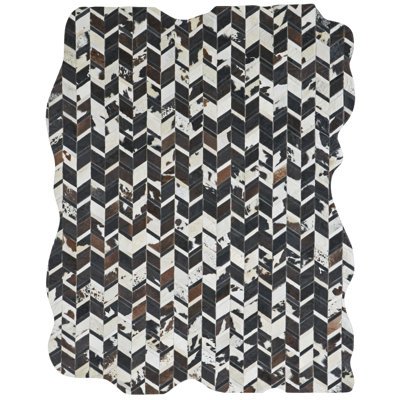 Brooksie Cowhide Geometric Area Rug in Brown/White