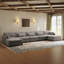 Canapé modulaire rembourré 7 pièces en velours côtelé gris clair avec dossier coussiné et repose-pieds amovible Maelina-108111417
