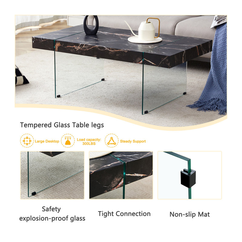 43.3"X23.6" Black Marble-Patterned MDF Coffee Table With Tempered Glass Legs.Suitable For Living Room.It Can Be Used Not Only As A Coffee Table But Also As A Side Table Or Display Stand.