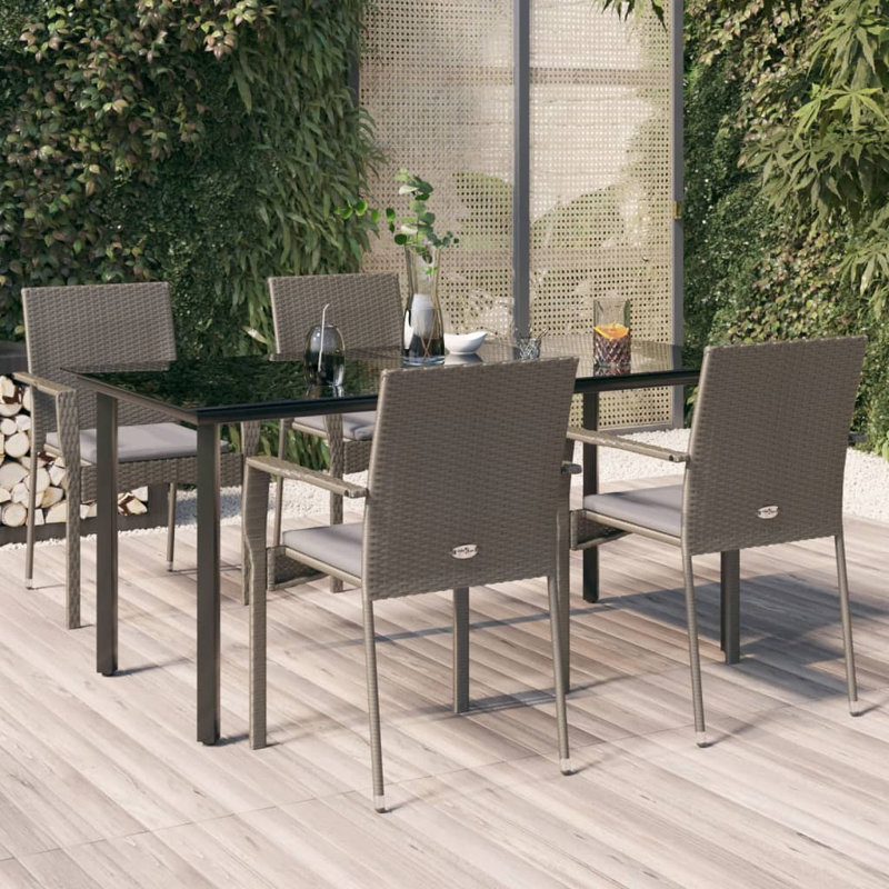 Dassiah 4 - Person Wicker Patio Dining Set with Rectangular Table , Cushions Included, Rectangle, Gray