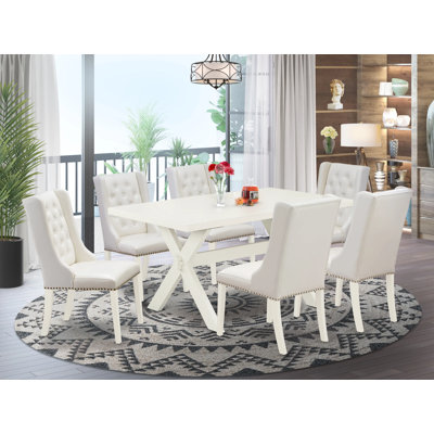Ensemble de table de salle à manger 7 pièces composé d'une table de salle à manger rectangulaire avec pieds en X et 6 chaises parsons en similicuir gris clair, multicolore