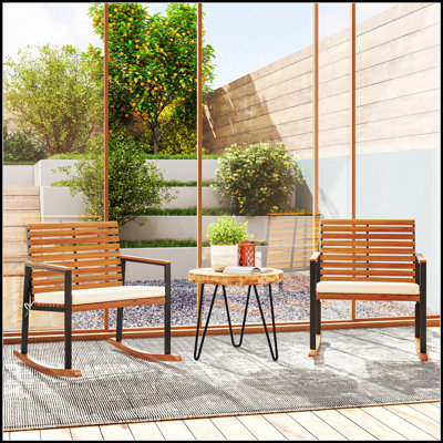 Ensemble de 2 chaises berçantes d'extérieur en bois d'acacia avec accoudoirs et coussins pour la détente