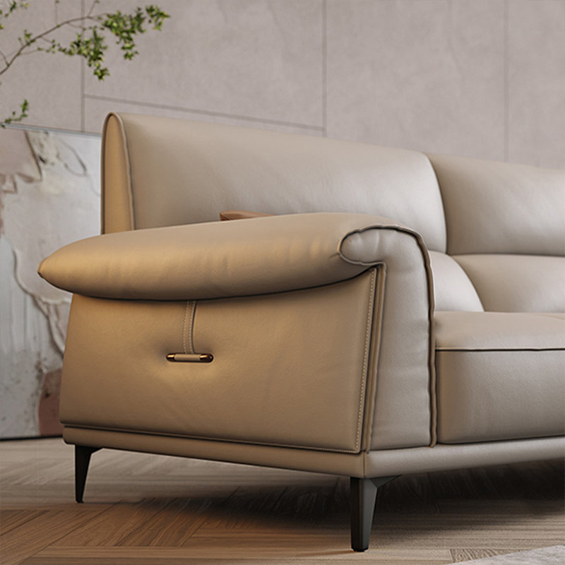 Fauteuil à accoudoirs évasés gris en cuir véritable avec repose-pieds