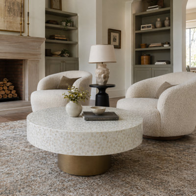 35X35x16" Unique Cream Capiz Coffee Table With Gold Pedestal Base