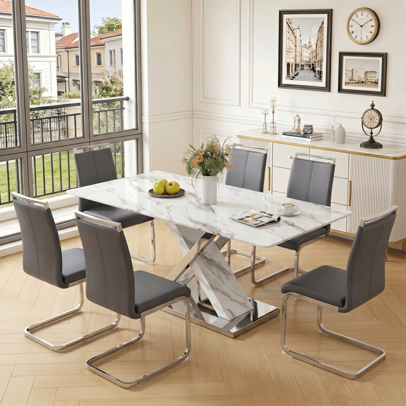 Ensemble de salle à manger 7 pièces rectangulaire moderne en faux marbre avec chaises en porte-à-faux en similicuir