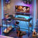 Nedyo 48" L-Shaped Computer Desk with Power Outlet, LED Gaming Work Desk with Monitor Stand