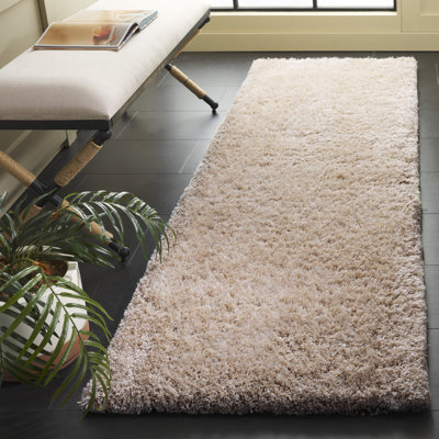 Delane Handmade Shag Champagne Area Rug
