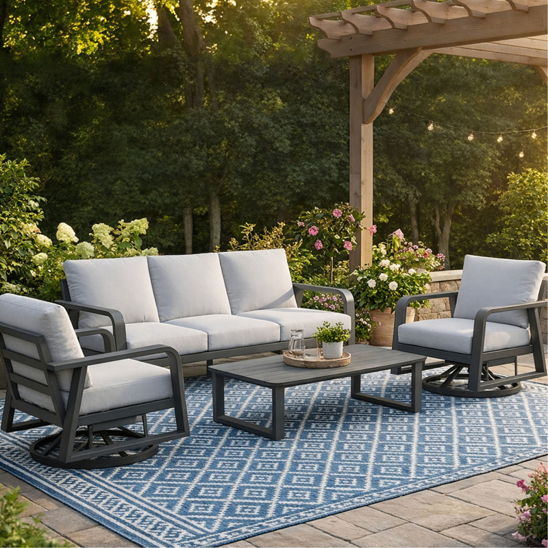 Un canapé trois places + deux chaises pivotantes + une table basse