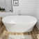 63" Solid Surface Stone Resin Oval-shaped Freestanding Soaking Bathtub With Overflow