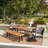 Poitras 6 - Person Acacia Wicker Patio Dining Set with Rectangular Table
