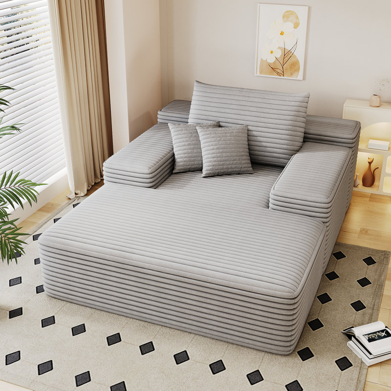 Chaise longue surdimensionnée en fausse fourrure moelleuse, idéale pour une détente confortable et un décor de salon élégant, gris
