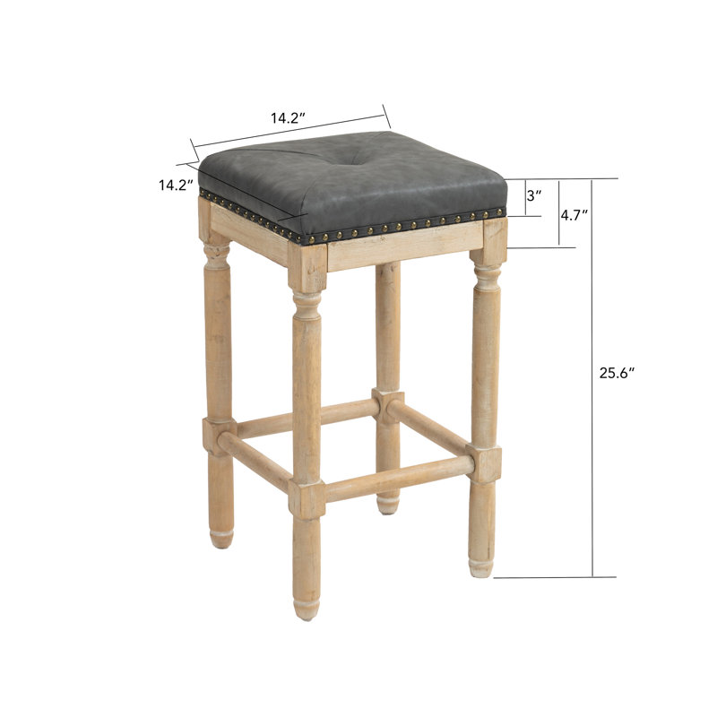 26 po. Tabourets gris foncé de 2 po. Parfait pour divers espaces à hauteur de comptoir comme les îlots de cuisine, les tables de travail et les bars à domicile. Fabriqué en bois d'hévéa massif avec une finition brossée classique. Siège confortable haut