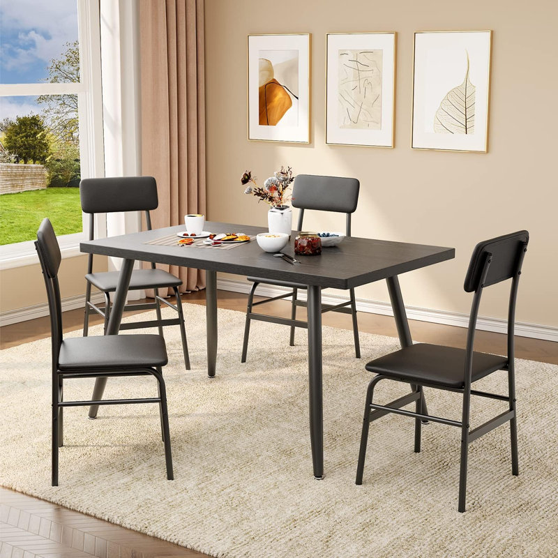 Ensemble de salle à manger 5 pièces Clorinda pour 4 personnes avec chaises rembourrées et structure en métal, Noir