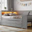 Lit de jour pleine grandeur avec tablettes de rangement, tiroirs, lit gigogne, station de charge, lumière DEL, bureau et armoire, gris