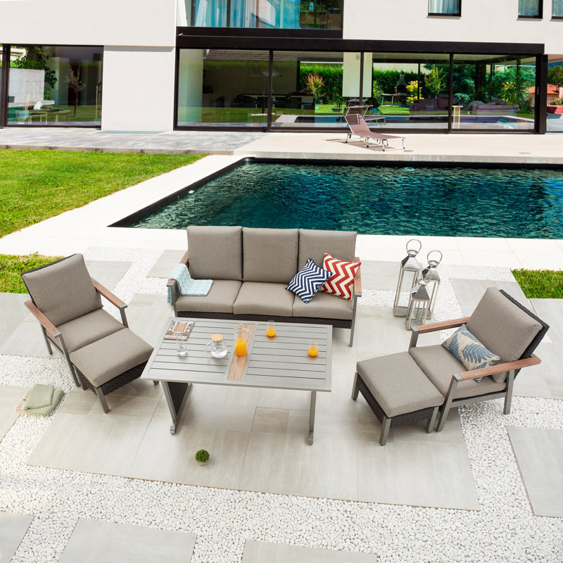 Bertolde 5 - Person Wicker Patio Dining Set with Rectangular Table , Cushions Included