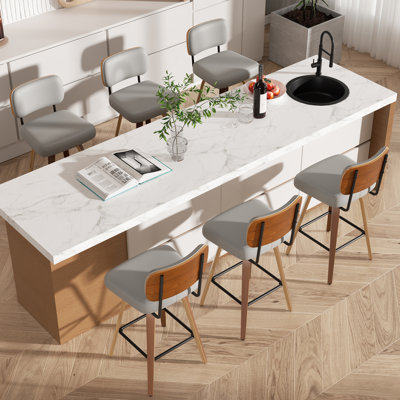 Tabouret pivotant rembourré à hauteur de bar