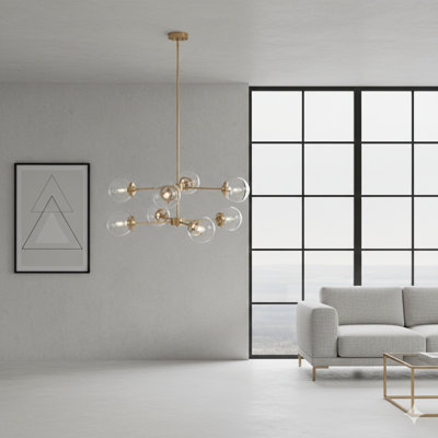 Lustre en métal à huit lumières avec ampoules sphériques, en finition dorée et transparente (voir détails ci-dessous).