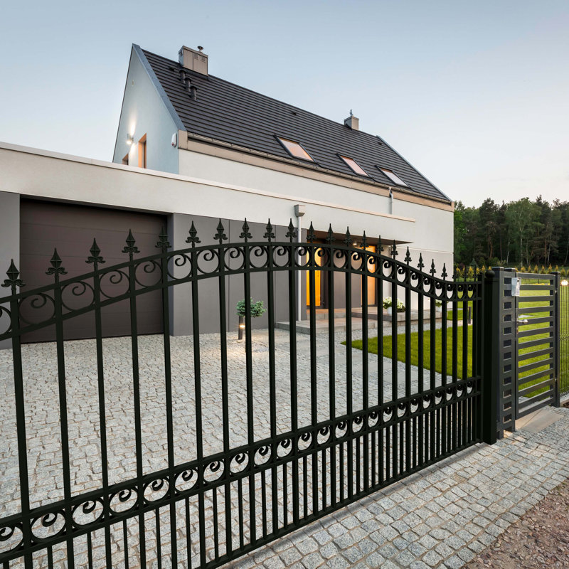 Black Steel Arched Ornamental Driveway Gate with Pointed Pickets