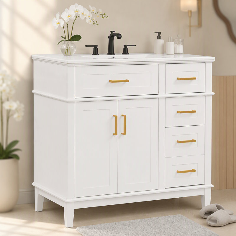 Ce meuble-lavabo moderne de 36 po avec lavabo en céramique, porte à fermeture en douceur et 4 tiroirs de rangement offre un look raffiné avec une fonctionnalité pratique au quotidien.