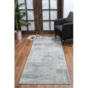 Tapis géométrique en plastique polypropylène bleu / beige Elegance