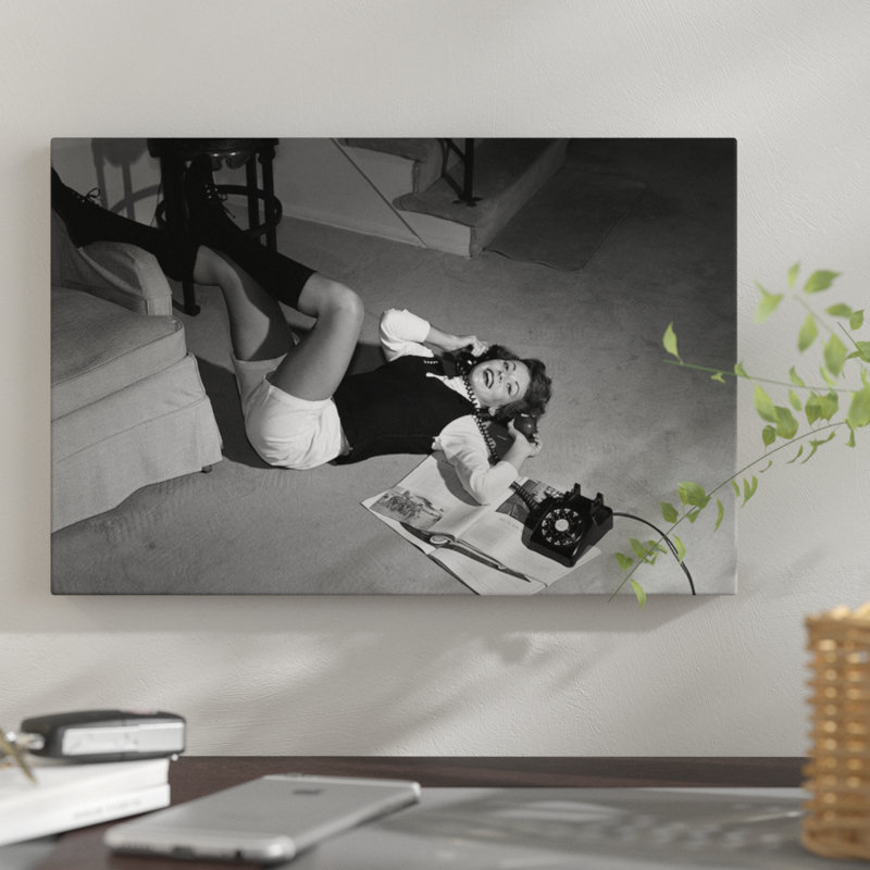 " 1960s Teenage Girl Lying On Floor Wear Shorts Knee Socks Reading Magazine Talking On Telephone Looking At Camera " by Vintage Images
