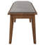 Élégant banc de salle à manger rembourré gris avec un design Mid-Century moderne et une finition noyer durable, parfait pour des sièges supplémentaires