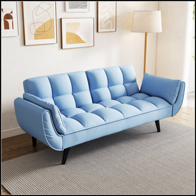 Comfortable Blue Sofa With Soft Armrests And Throw Pillows, Perfect For Small Apartments And Bedrooms.