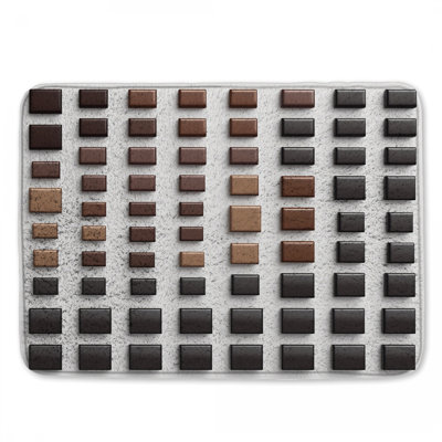 Tapis de bain brun à carreaux carrés