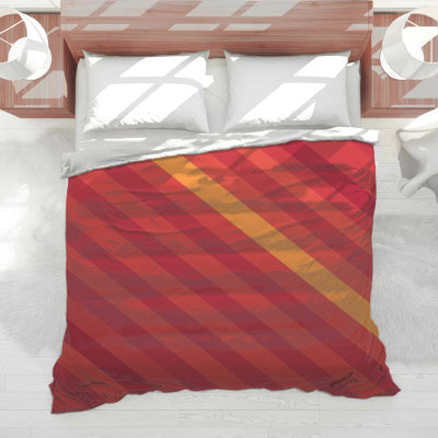 Édredon rouge à rayures diagonales orange