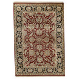 Hand Knotted Wool Area Rug in Red And Black