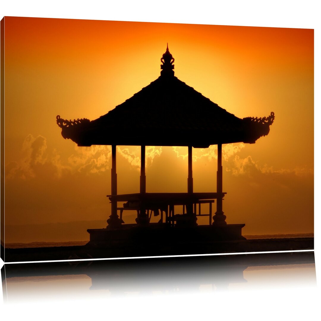 Leinwandbild Pagode in Bali im Sonnenuntergang