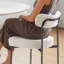 Ensemble de 4 chaises de salle à manger Boucle avec dossier incurvé et pieds en métal robustes pour un confort et un style modernes.
