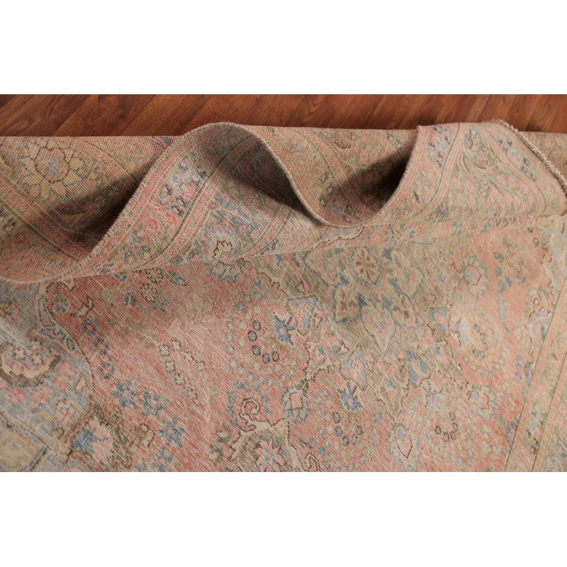 Tapis traditionnel rose en laine à médaillon 6 x 9