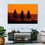 Cowboys au coucher du soleil-107684383