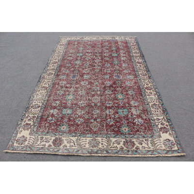 Vintage Turkish Rug Elegant Red And Blue Floral Pattern Offers A Unique Handmade Look For Any Area